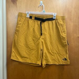 The North Face men’s Golden Yellow buckle athletic Shorts